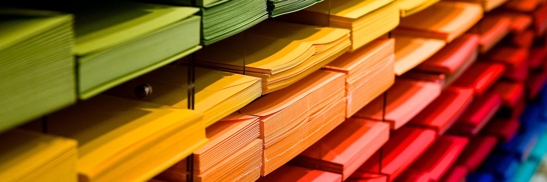 multi-colored-folders-piled-up